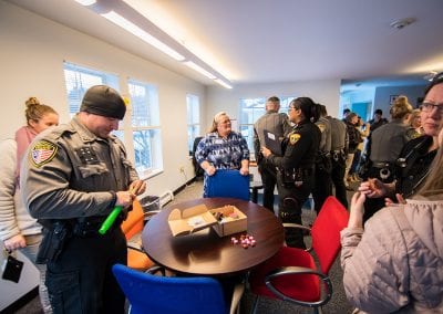 Guests interact with therapeutic tools on display at PUCK Open House January 2020